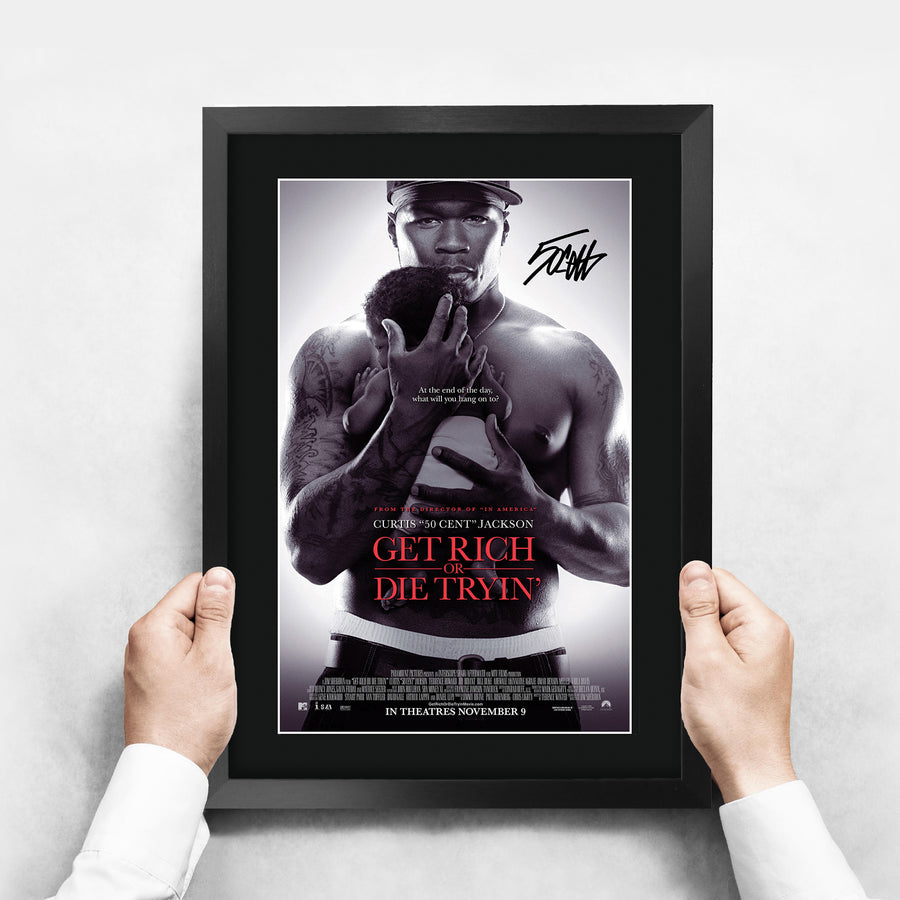 The framed print held up to show its size