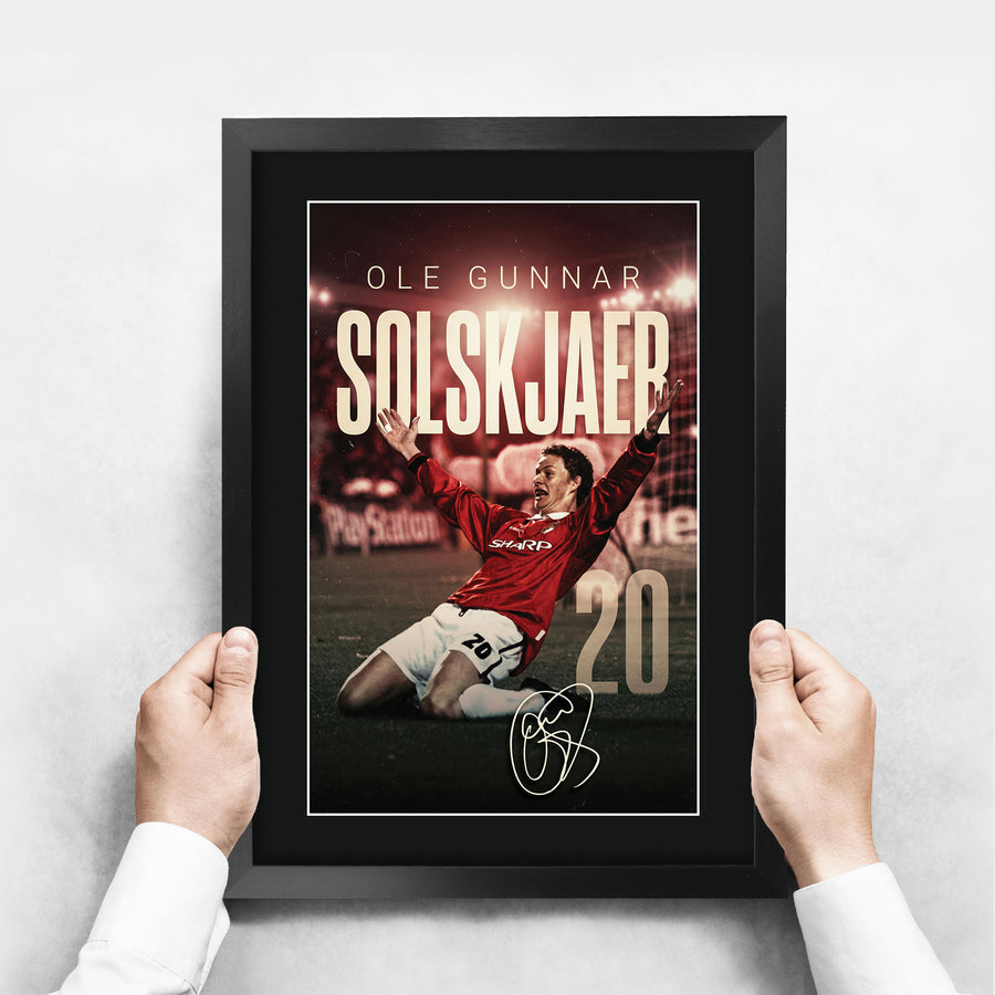 The framed print held up to show its size