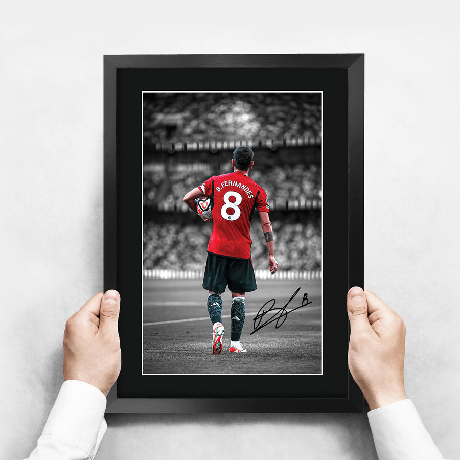 The framed print held up to show its size
