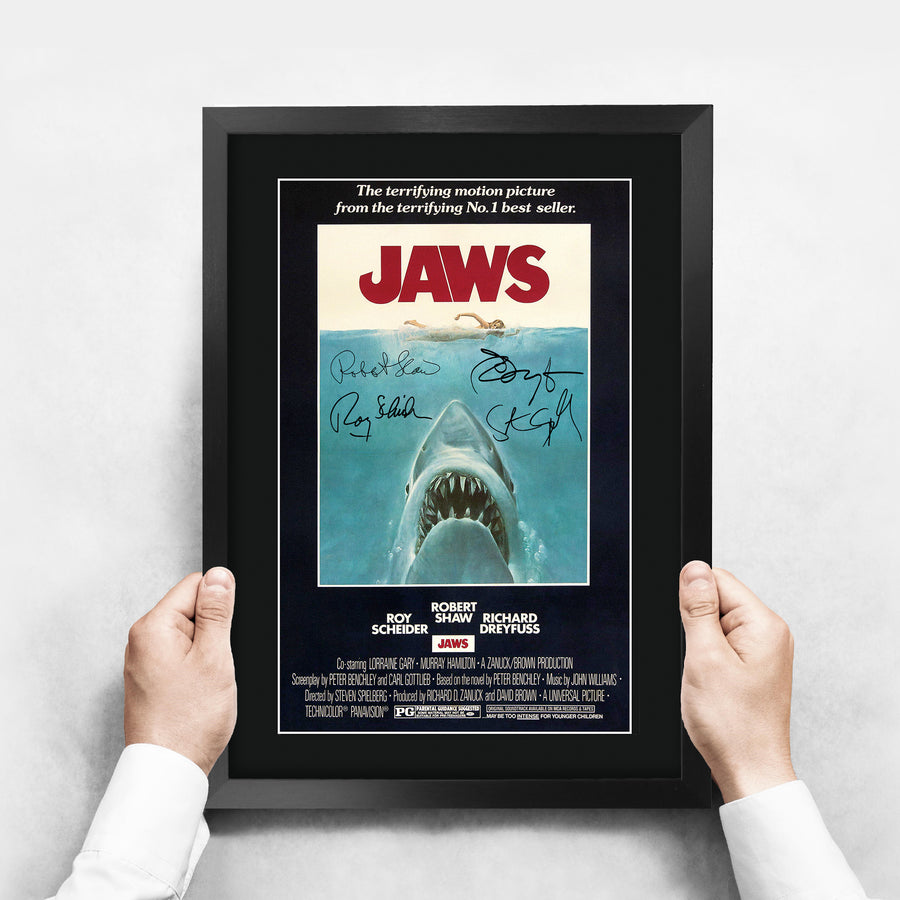 The framed print held up to show its size
