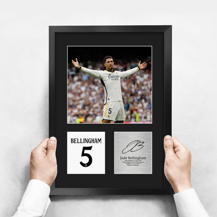 The framed print held up to show its size